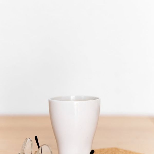 Calendar and a cup of coffee indicating a daily routine.